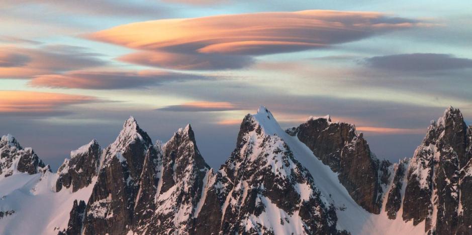Lenticular clouds glow in the sunset in the Picket Range in North Cascades National Park. Photo courtesy of Steph Abegg.